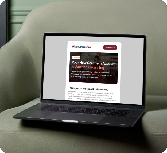 Laptop on a green sofa displaying a Southern Bank welcome page with a bold headline: 'Your New Southern Account Is Just the Beginning'